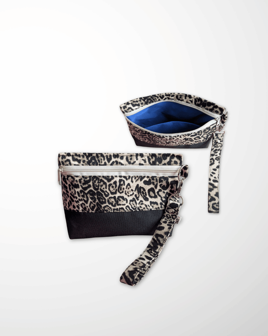 Two bags with leopard print straps on a white background