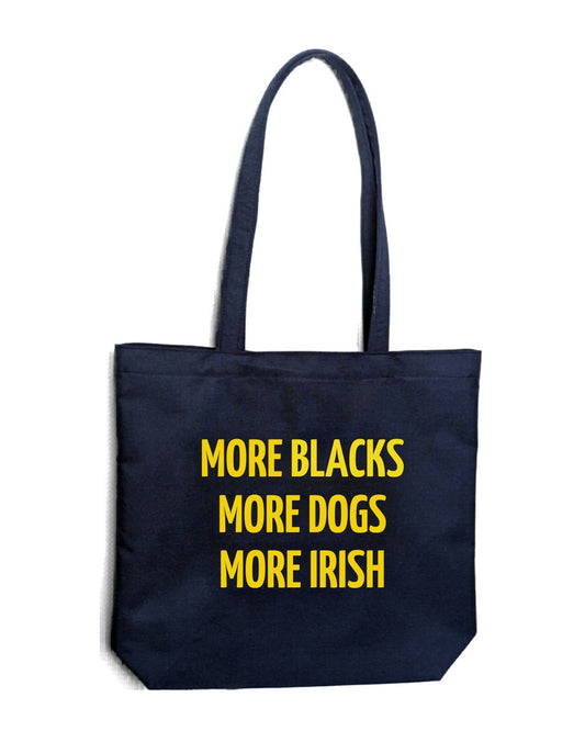 Navy tote bag with yellow text MORE BLACKS, MORE DOGS, MORE IRISH on a white background